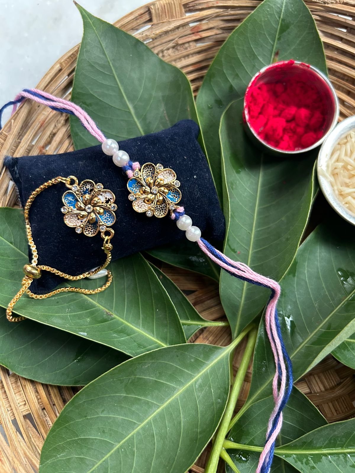 Floral Designer Rakhi with Adjustable Bracelet – Bhaiya Bhabhi Rakhi Set in Pastel Purple for Raksha Bandhan 2025