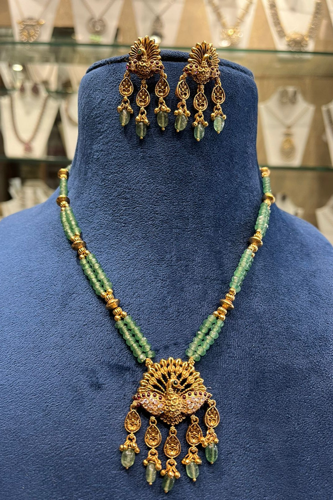 Taditional Peacock Design Necklace Set | Green Beaded Chain & Dangle Earrings