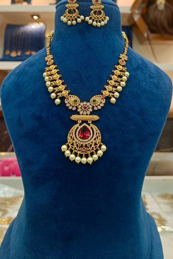 Traditional Gold-Plated Temple Necklace Set with Pearls & Stone Pendant – Bridal & Ethnic Jewelry for Women